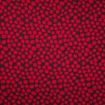 Zwarte polyester / viscose tricot met rode bollen van 'Stitched By You'