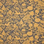 Jacquard tricot in grijs met gele bloemen