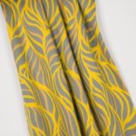 Rekbare jacquard met bladmotief