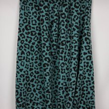 Blauw gemeleerde sweaterstof met pantervlekken en zachte achterkant