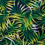 Zwarte viscose linnen mengeling met tropische bladeren