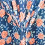 Jeanslook tricot met bloemen