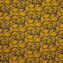 Oker viscose tricot met zwart abstract motief