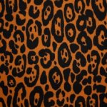 Oranje/bruine viscose met luipaardprint