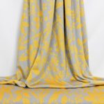 Grijze jacquard met oker bloemenpatroon
