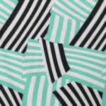 Polyester crêpe stretch wit met turquoise/zwart gestreept patroon - Burda
