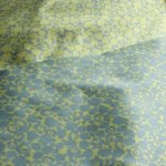 Jacquard mikado double face bloemen groen/blauw - Lorré