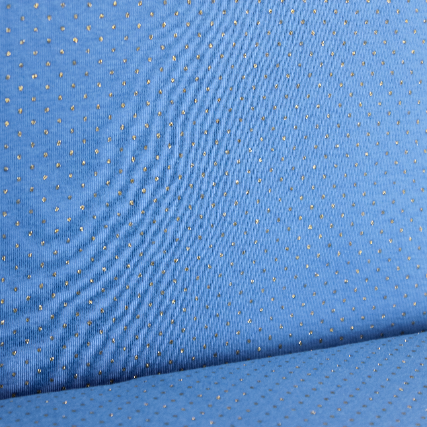 Tricot blauw met gouden lurex bolletjes