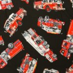 Katoen zwart met brandweerwagens
