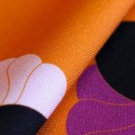 Viscose oranje met golvend motief