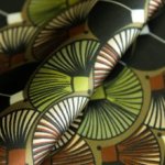 Polyester groen met geometrisch patroon