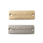2 metalen labels 'Handmade' - 30 x 10 mm - zilver & goud - Prym