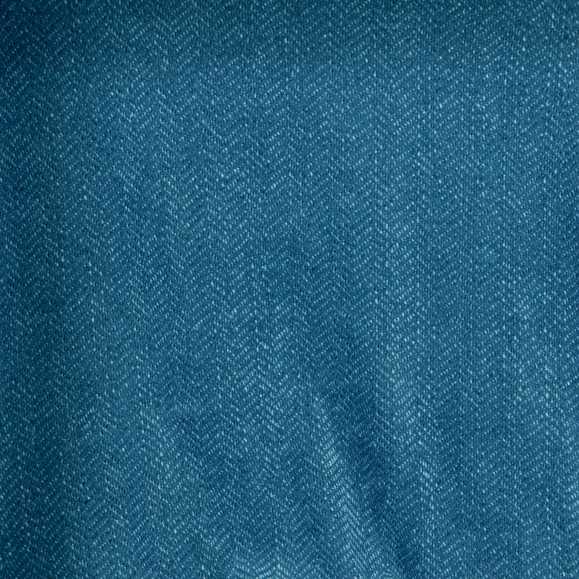 Bouclé turquoise met visgraatpatroon