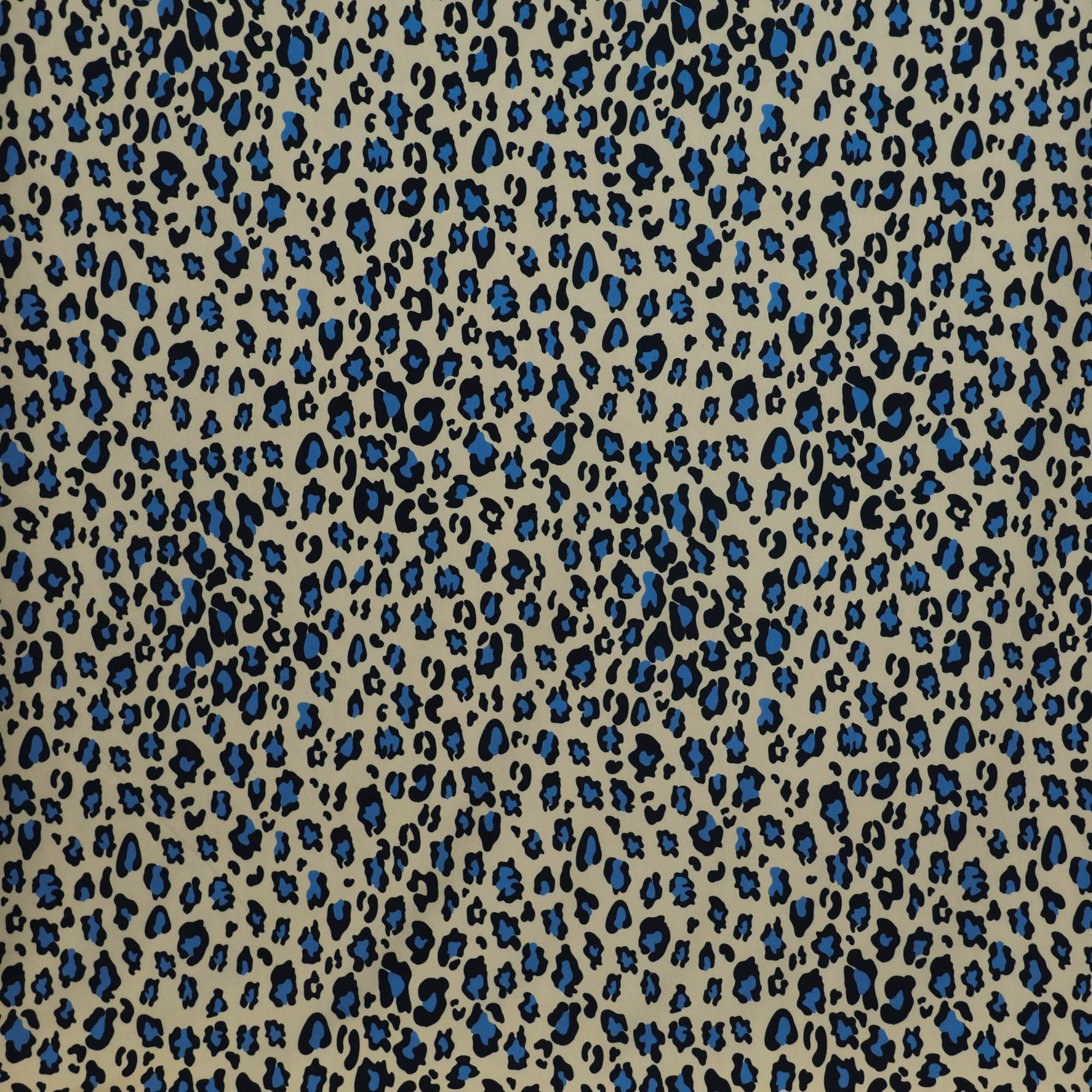 Tricot beige met blauwe luipaardprint