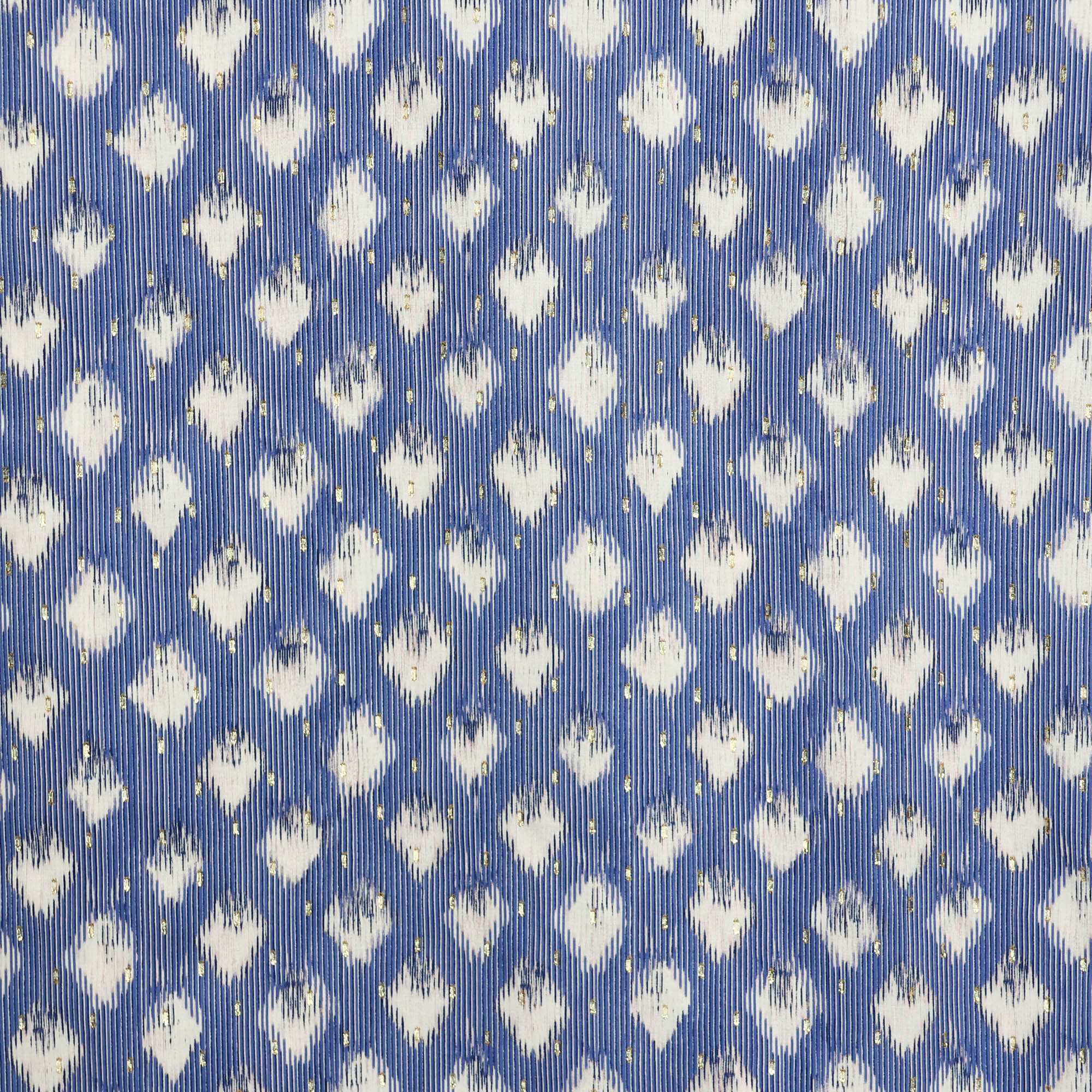 Viscose met blauwe print en gouden stipjes