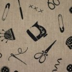 Canvas beige met naaibenodigdheden