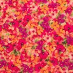 Viscose met roze, oranje en fushia bloemen