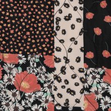 Matelassé zwart, roos met bloemen