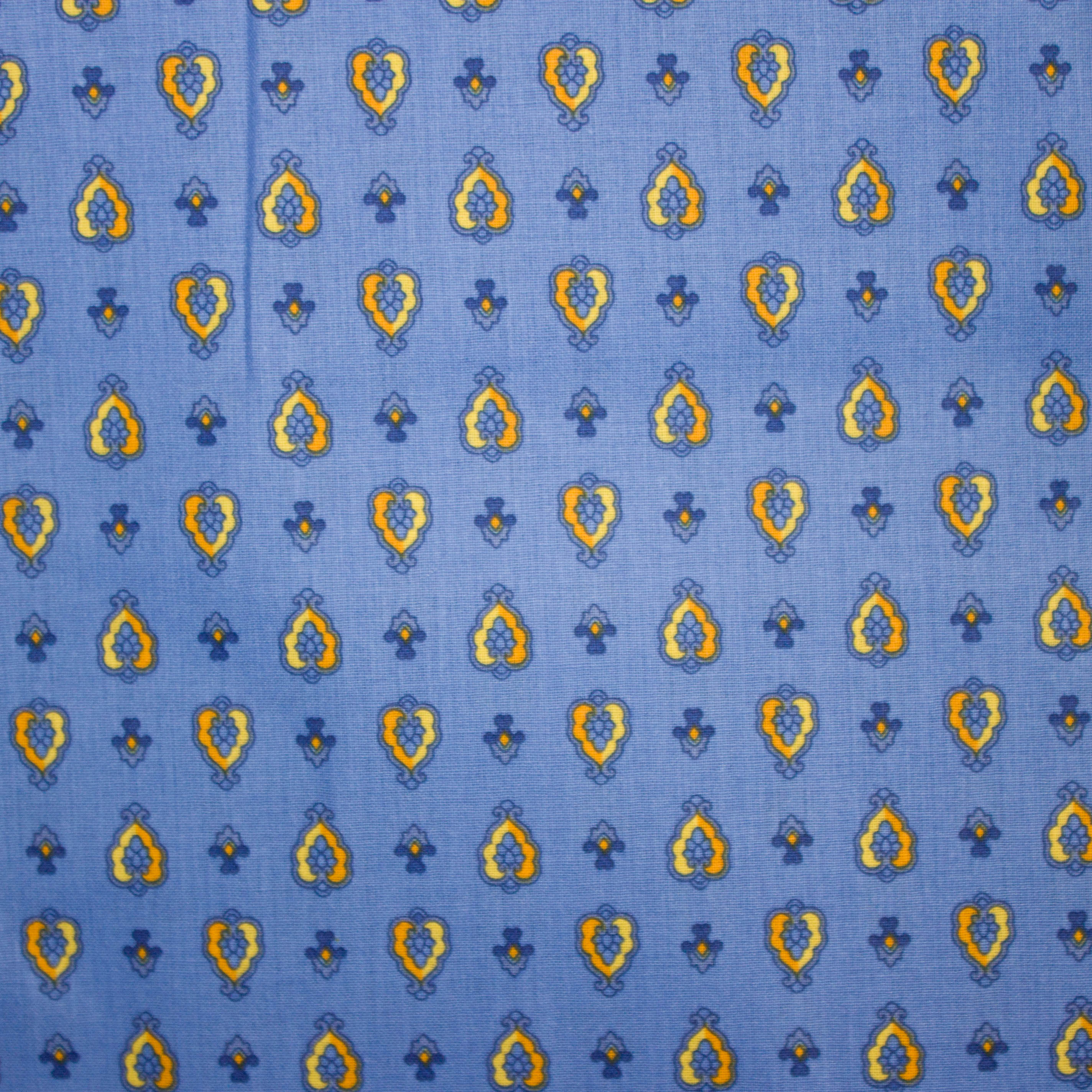 Katoen blauw met geel ornament motief