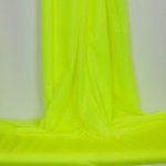 Polyester stretch met gaatjes fluo geel