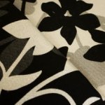 Jacquard lurex grijs / zwart met bloemen