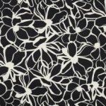 Katoen satijn zwart met witte bloemen - Nerida Hansen