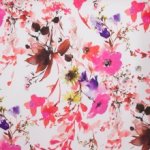 Polyester wit met roze bloemen - Lorré