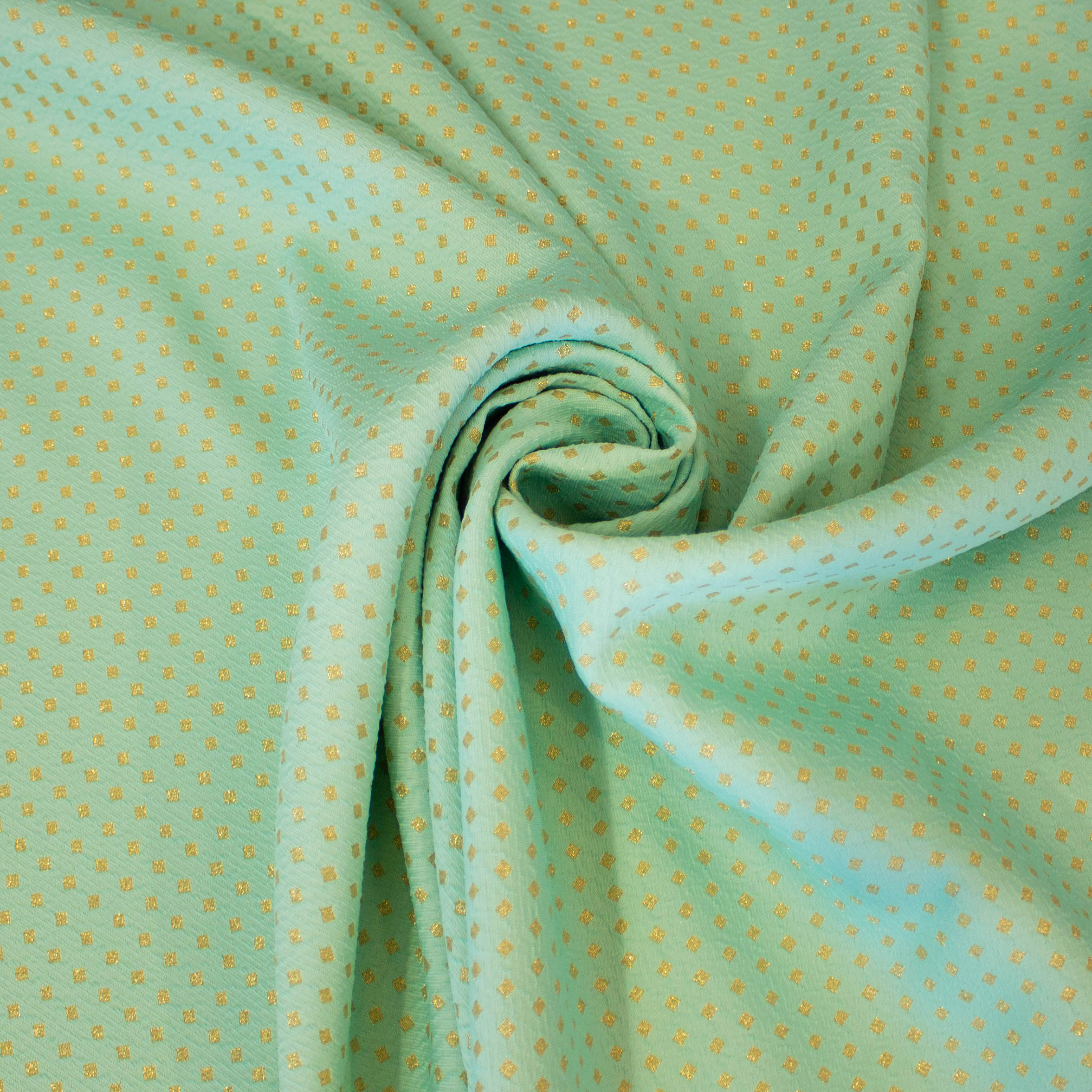 Jaquard polyester stretch munt met gouden blokjes - Lorré