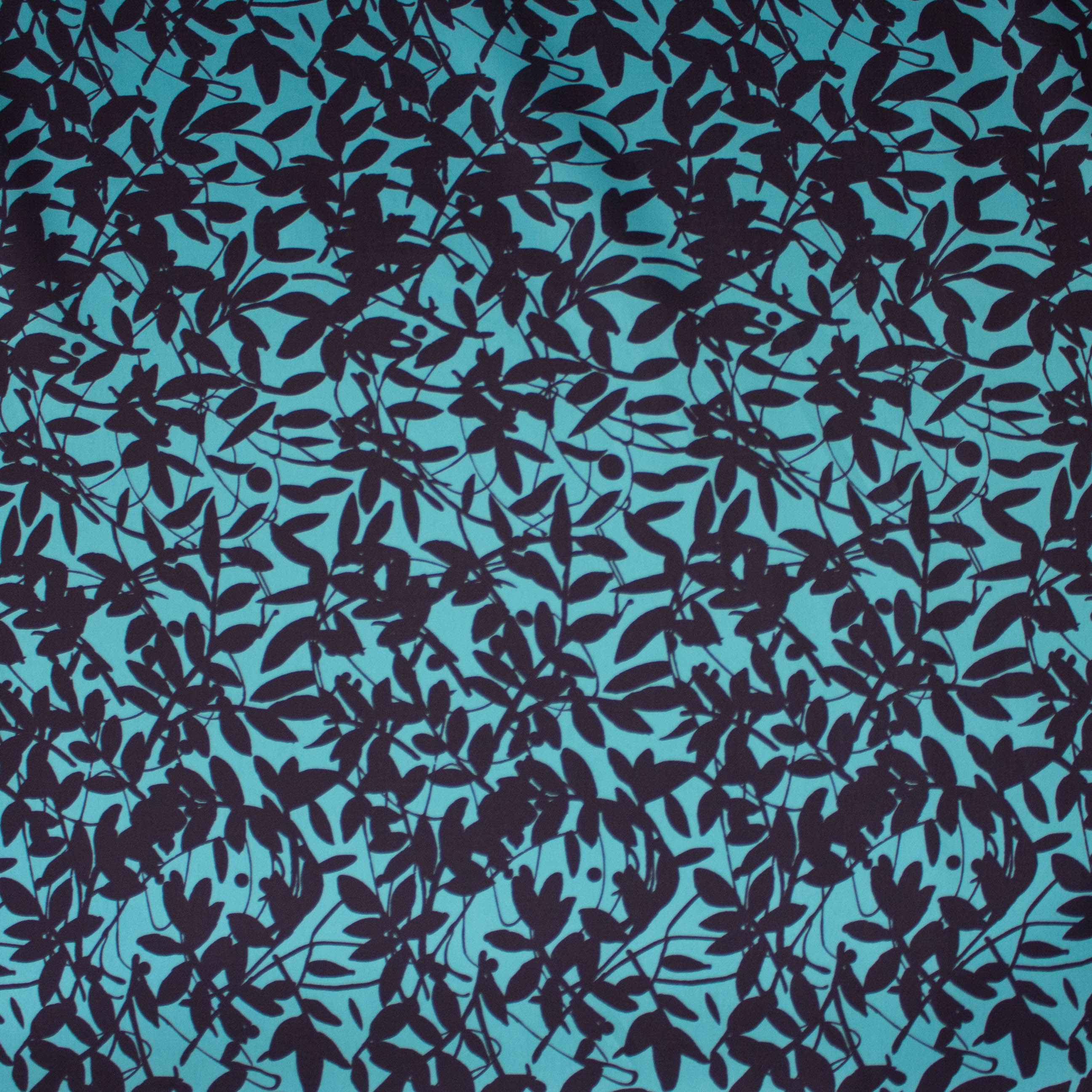 Zijde polyester turquoise met plantenpatroon - Lorré