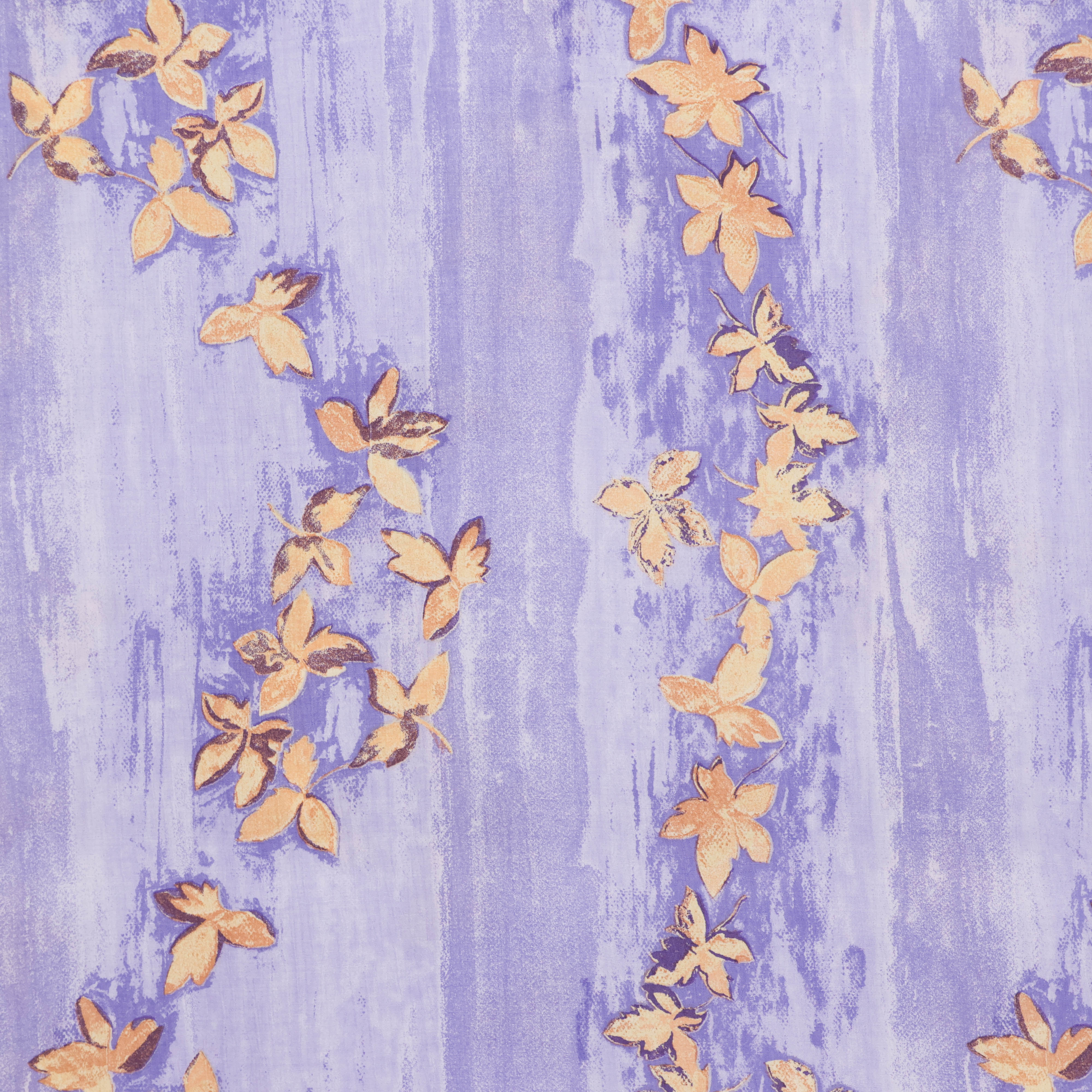 Crêpe viscose lila met licht oranje bloemen