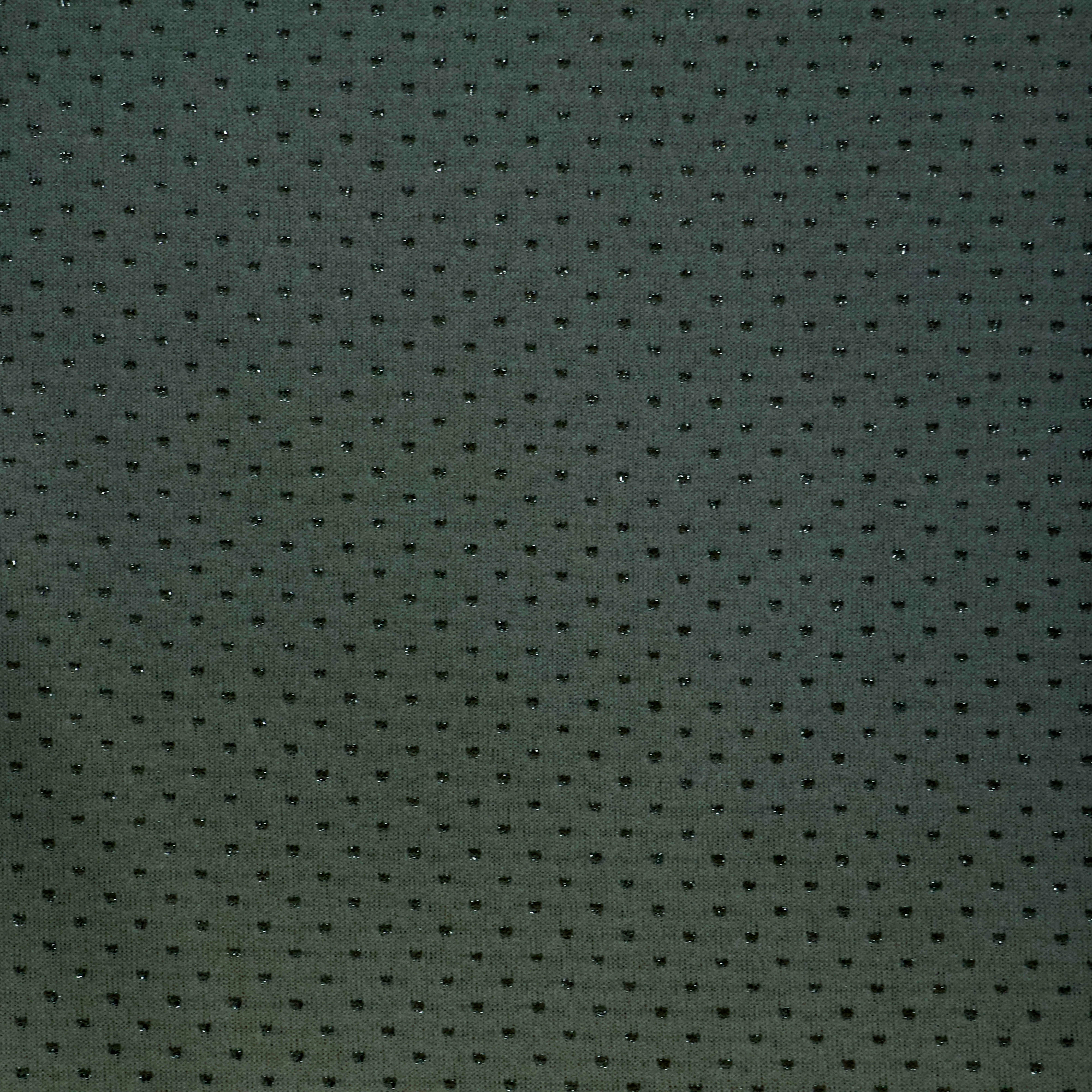 Brei donkergrijs met groene tint en glinsterende bolletjes
