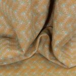 Chanelstof goud met turquoise accenten