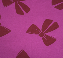 Sweaterstof cyclaam paars met strikken  - Qjutie & the Qjutest
