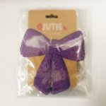 Applicatie paarse strik  - Qjutie & the Qjutest