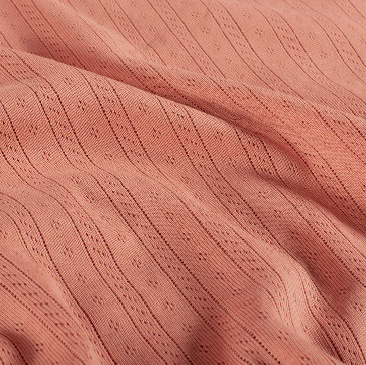 Pointelle tricot koraal