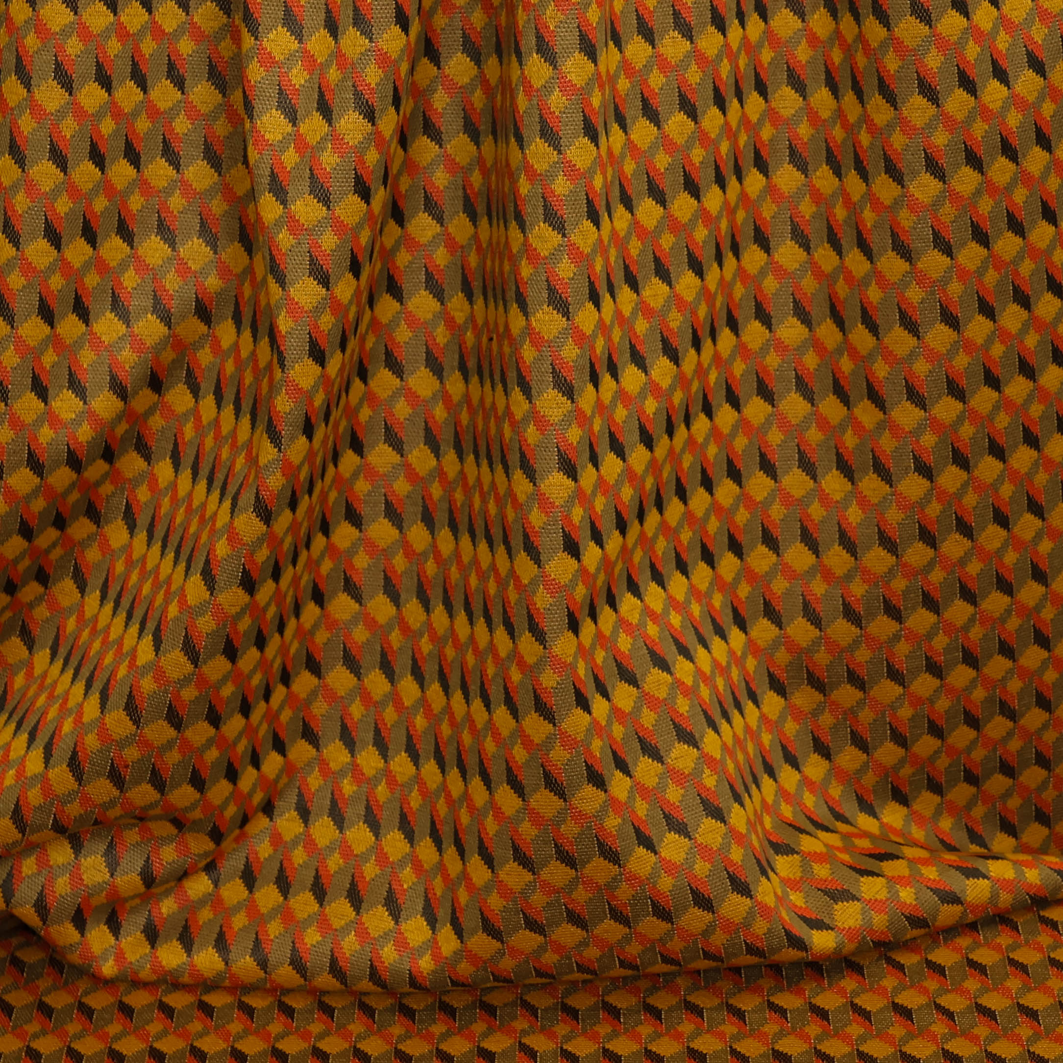 Breistof oranjetinten met geometrisch patroon