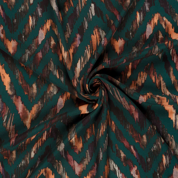 Viscose donkergroen met abstract patroon