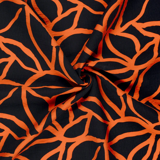 Geweven stof zwart met oranje patroon