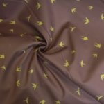 Softshell taupe met zwaluwen