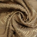 Viscose jacquard beige met bladermotief