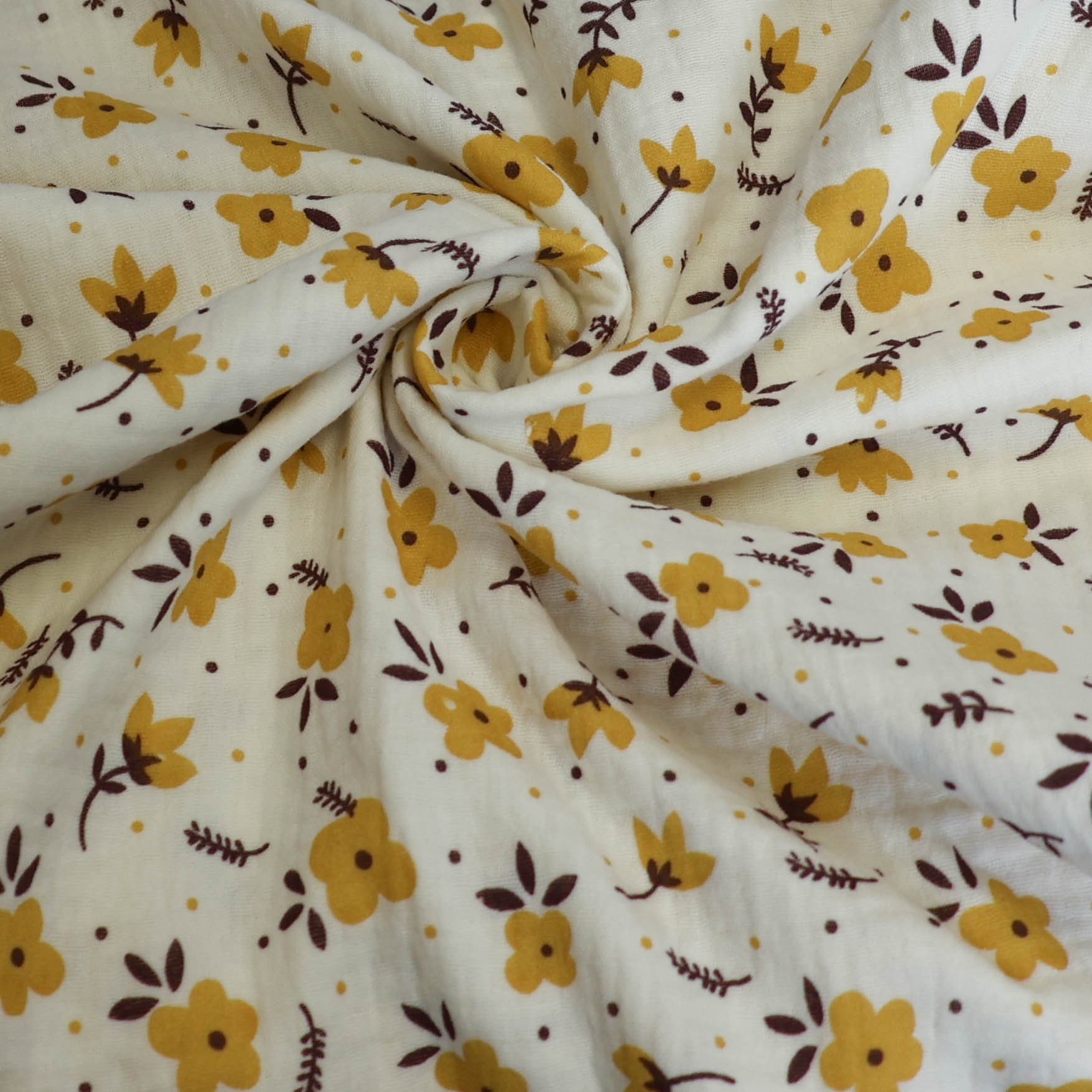 Double gauze gebroken wit met gele bloemetjes - Katia