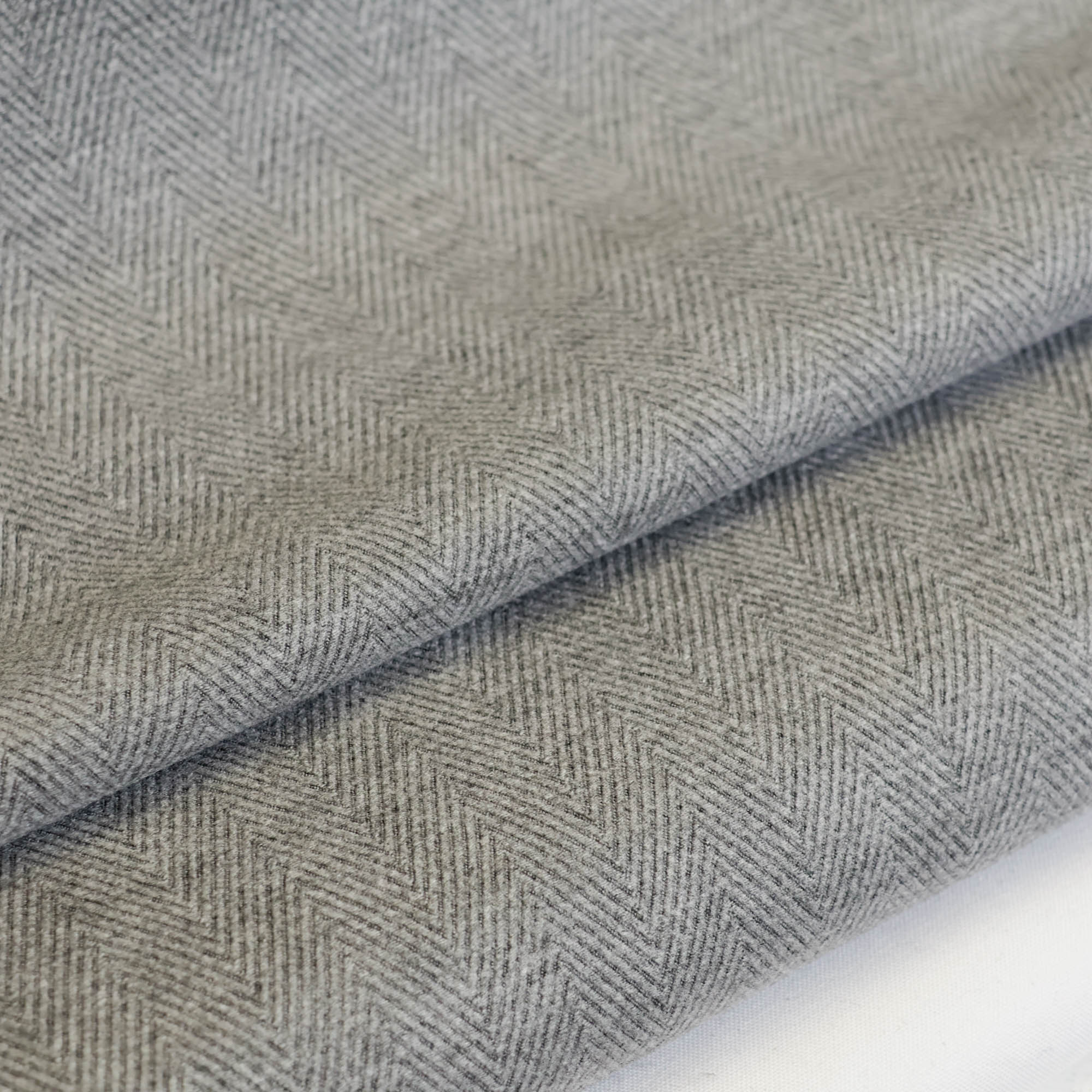 Tweed visgraat grijs
