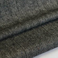 Tweed grijs met kleine gekleurde stipjes