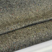 Tweed grijs met gekleurde stipjes