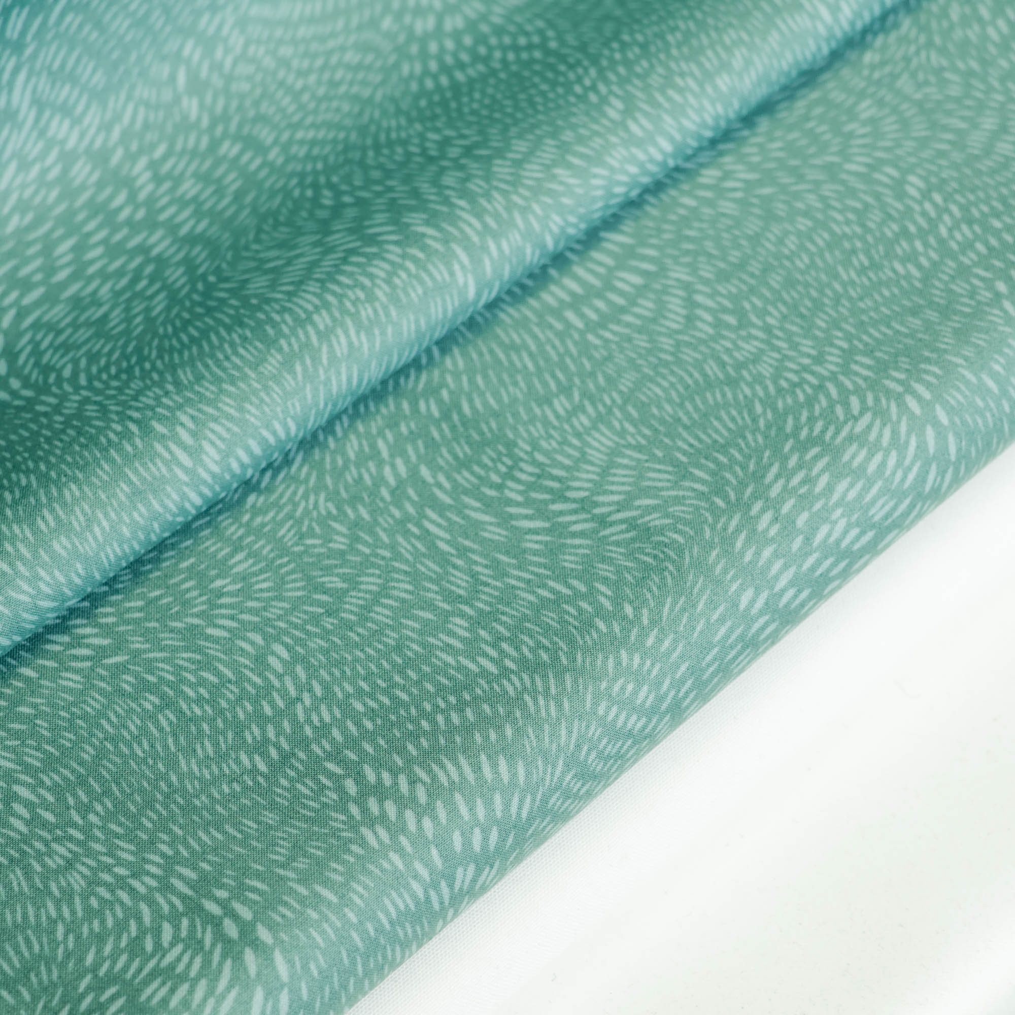Katoen licht groenblauw met patroon