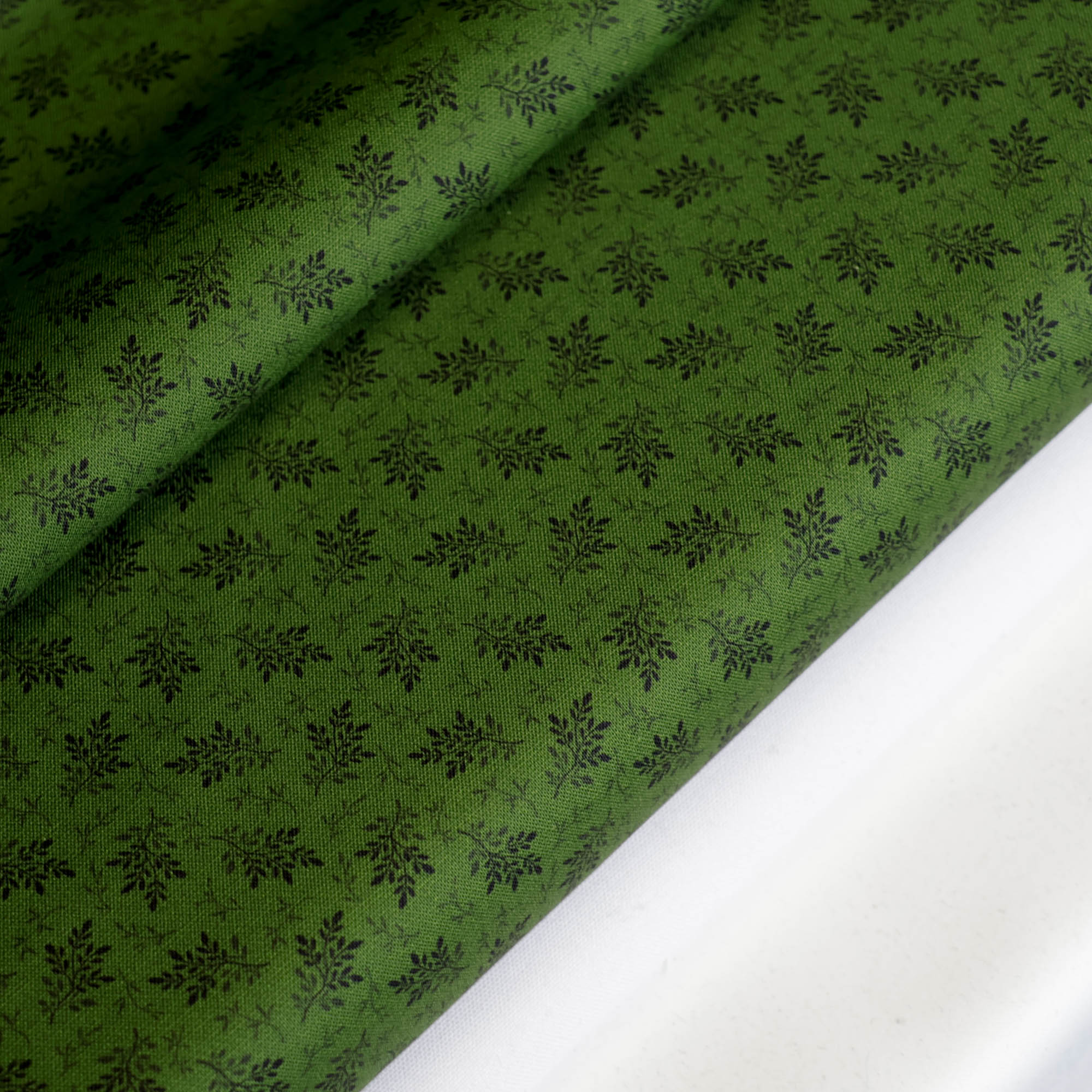 Katoen donkergroen met blaadjes