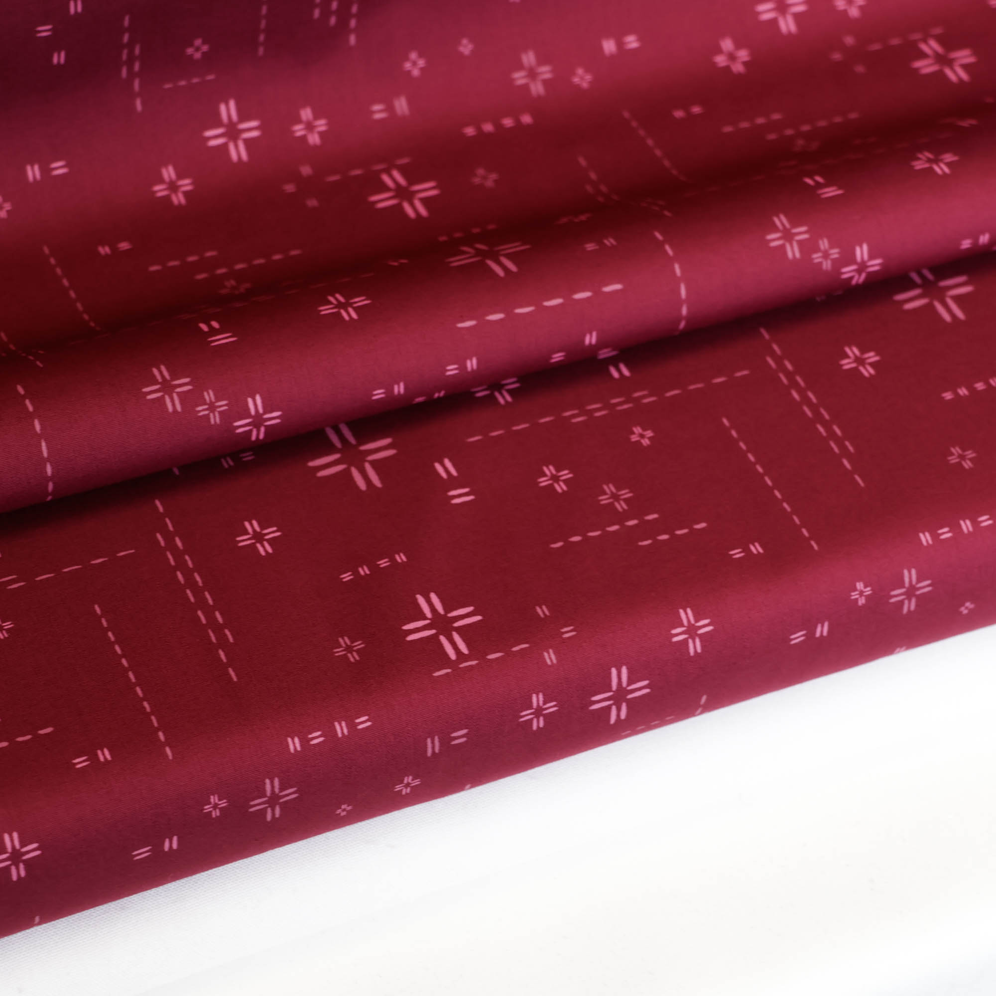 Katoen bordeaux met abstract patroon