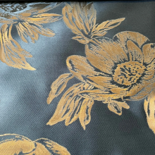 Jacquard zwart met bronzen bloemen