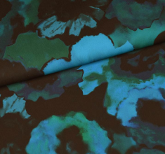 Polyester bloemenpatroon petrol-blauw