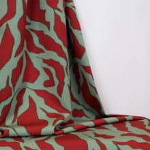 Polyester lichte stretch groen met rood tijgerpatroon   - A La Ville